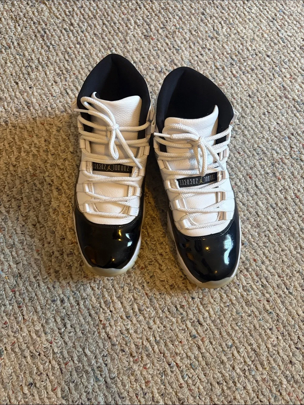 Jordan Men's Retro 11 White and Black Sneakers